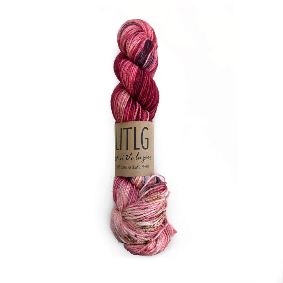 LITLG Sport Superwash Yarn - Thorn Color - Pink, read, and touches of brown